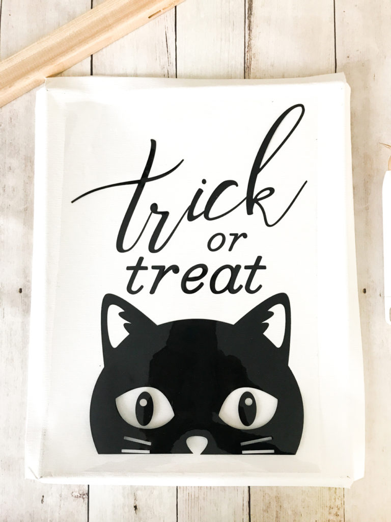 Placing the Halloween Trick or Treat Iron On Design on Canvas