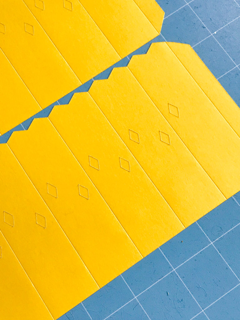 Making a Yellow DIY Paper Rosette with the Cricut Maker and Scoring Wheel by Pineapple Paper Co.