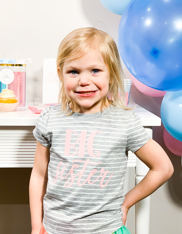 Big Sister at Gender Reveal Baby Shower - Gender Reveal Party Ideas by Pineapple Paper Co.