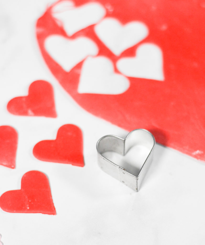 Valentine's Day Cupcakes with Red and Pink Heart Fondant Cupcake Toppers by Pineapple Paper Co.