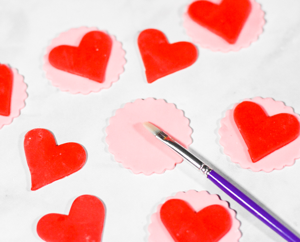 Valentine's Day Cupcakes with Red and Pink Heart Fondant Cupcake Toppers by Pineapple Paper Co.