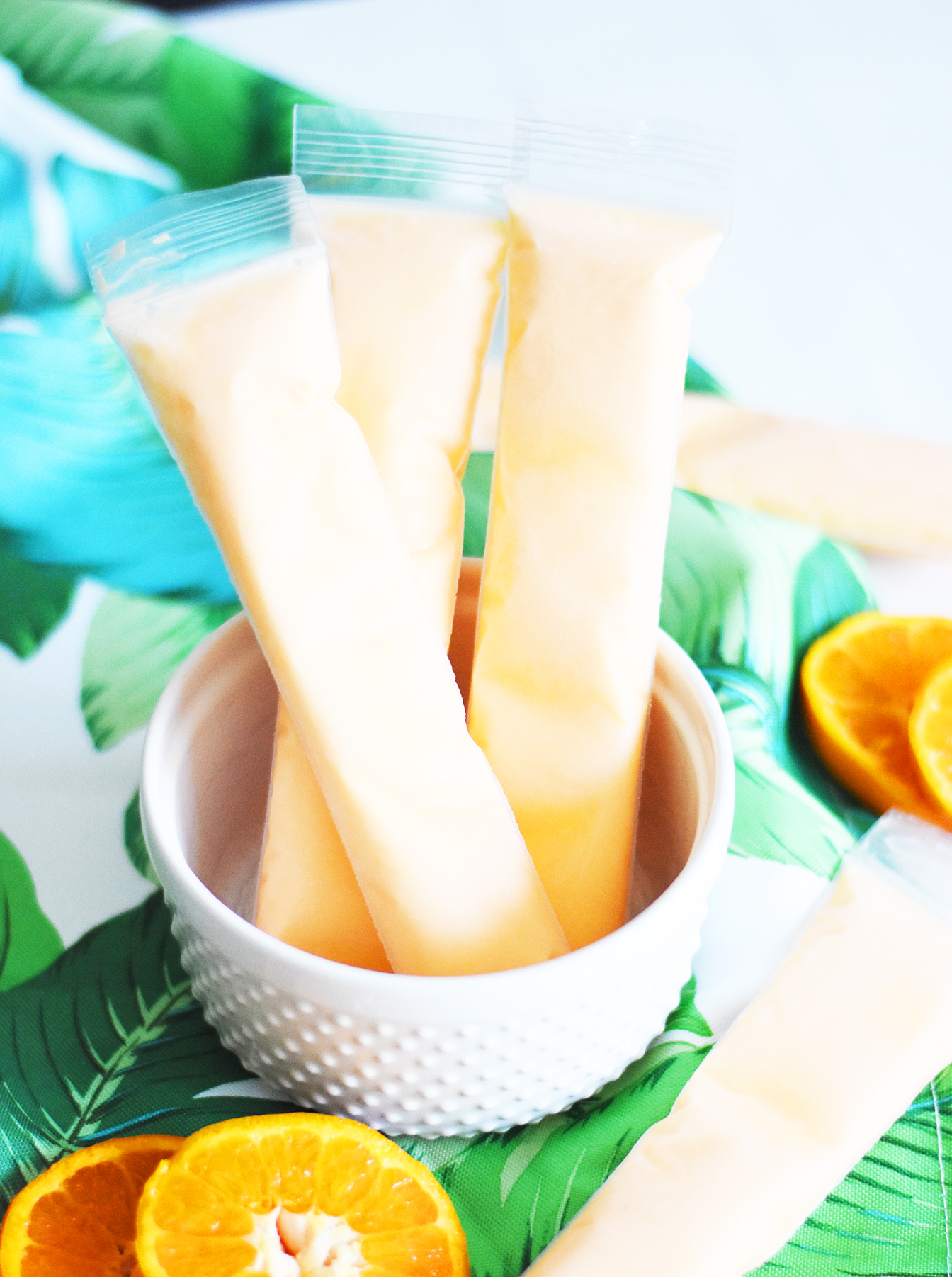 Easy Orange Dreamsicle Alcoholic Popsicle Recipe with Jackson Morgan Southern Cream by Pineapple Paper Co.