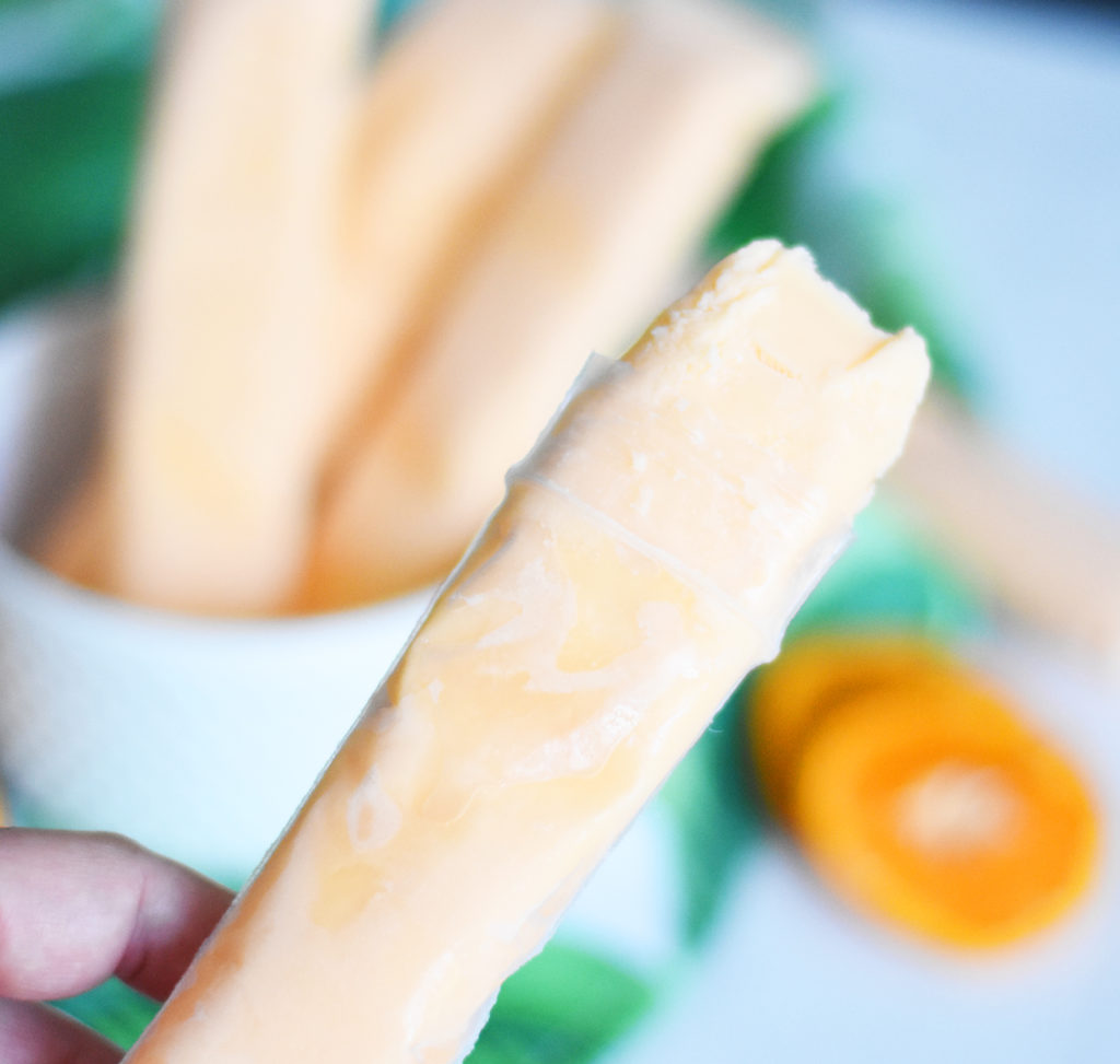 Easy Orange Dreamsicle Alcoholic Popsicle Recipe with Jackson Morgan Southern Cream by Pineapple Paper Co.