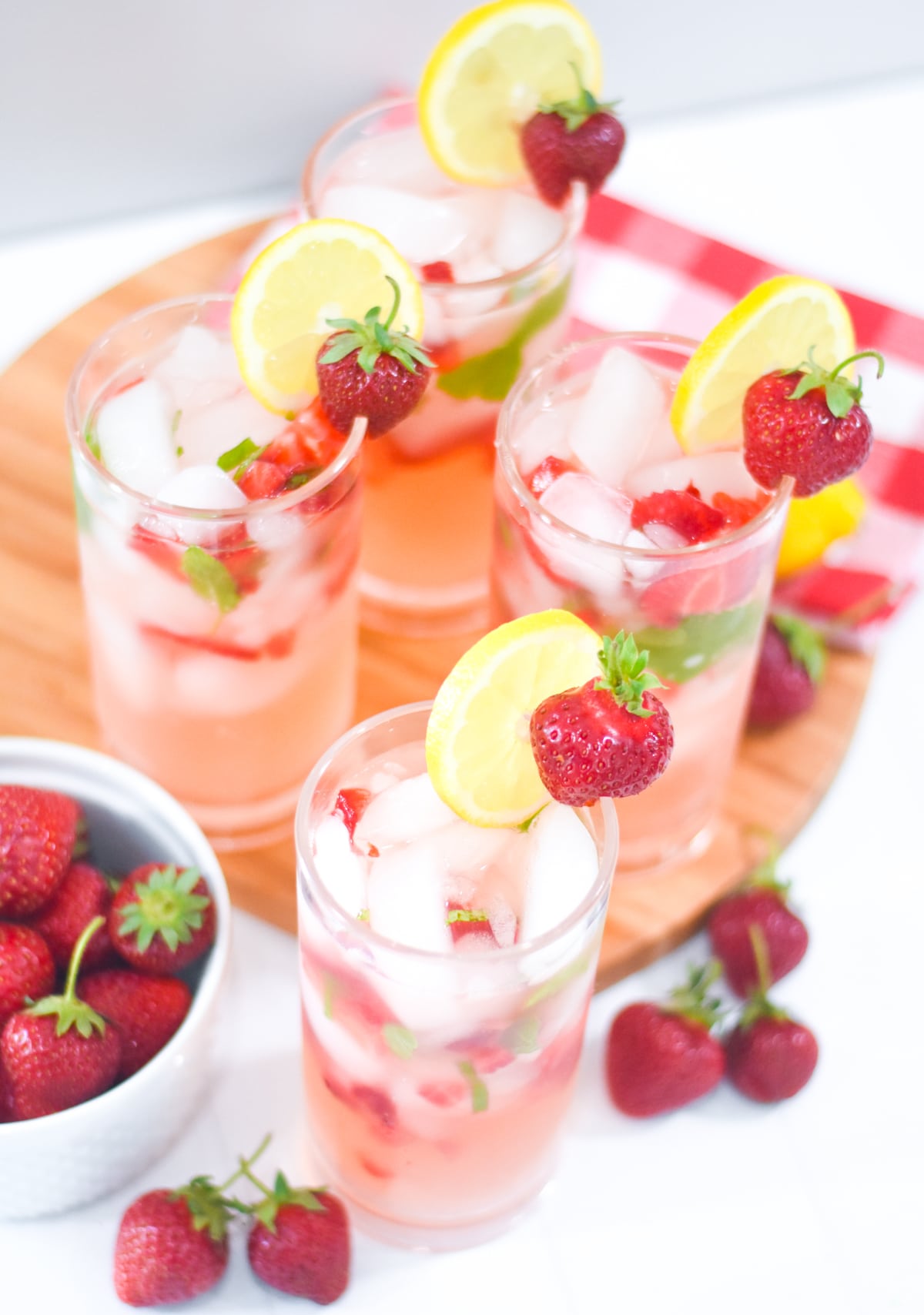 Easy Strawberry Mint Lemonade Recipe with Fresh Strawberries and Mint to Make a refreshing summer drink by Pineapple Paper Co.