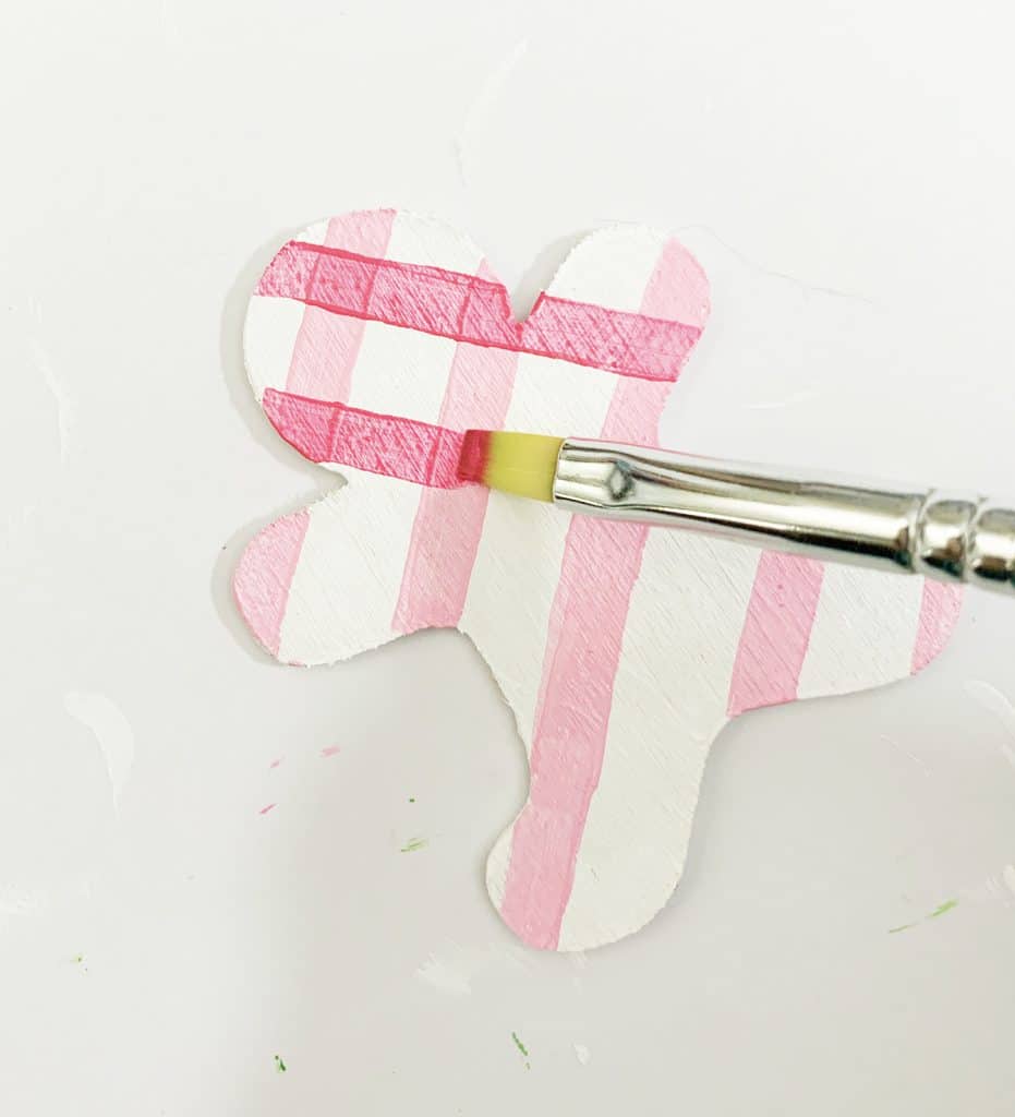 DIY Gingerbread Ornaments cut out of wood with the Cricut Maker by Pineapple Paper Co.