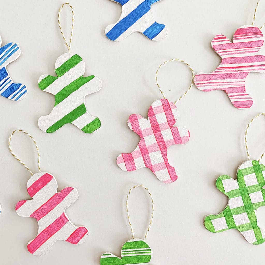 DIY Gingerbread Ornaments cut out of wood with the Cricut Maker by Pineapple Paper Co.
