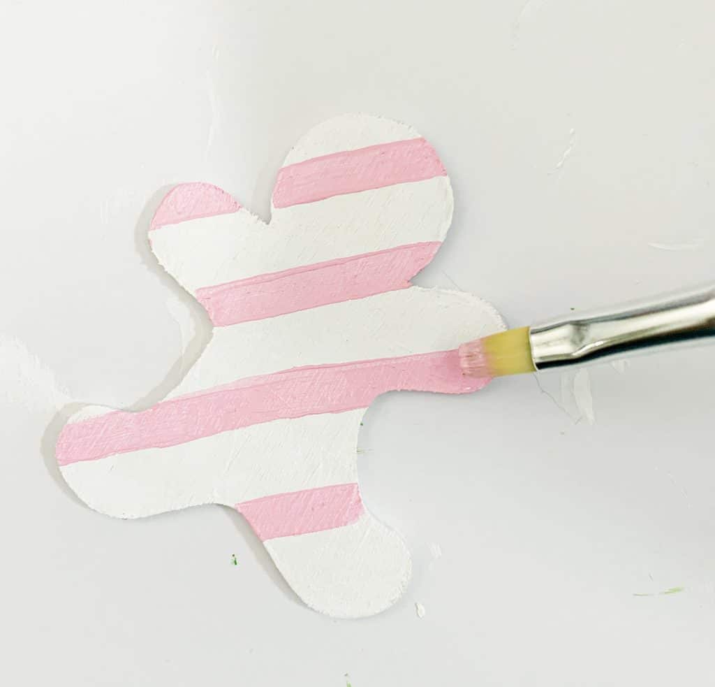 DIY Gingerbread Ornaments cut out of wood with the Cricut Maker by Pineapple Paper Co.