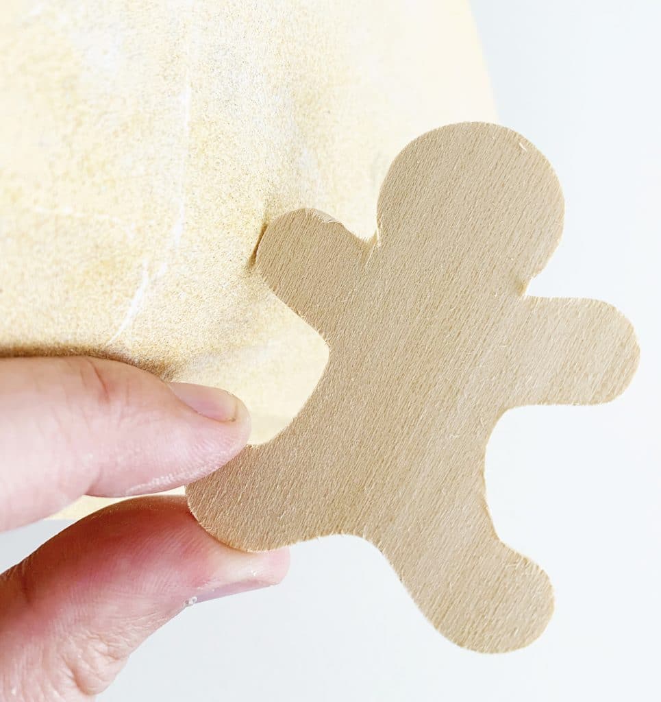 DIY Gingerbread Ornaments cut out of wood with the Cricut Maker by Pineapple Paper Co.