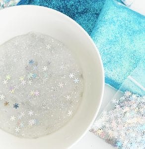 Frozen Inspired Glitter Slime Recipe for Frozen Birthday Parties and Favors by Pineapple Paper Co.