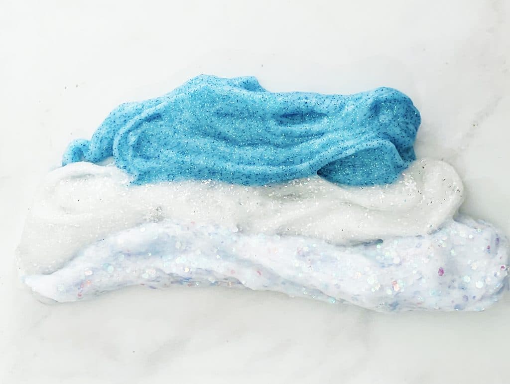 Frozen Inspired Glitter Slime Recipe for Frozen Birthday Parties and Favors by Pineapple Paper Co.