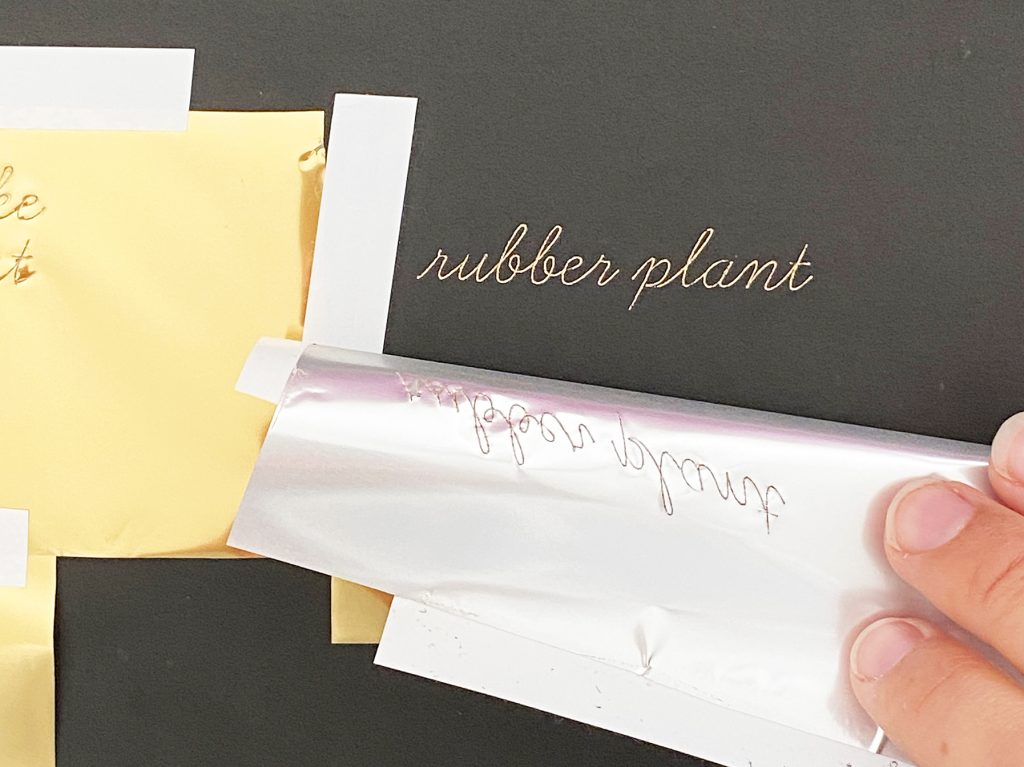 Foil Reveal of script on Black Kraft Board with Cricut Foil Transfer System