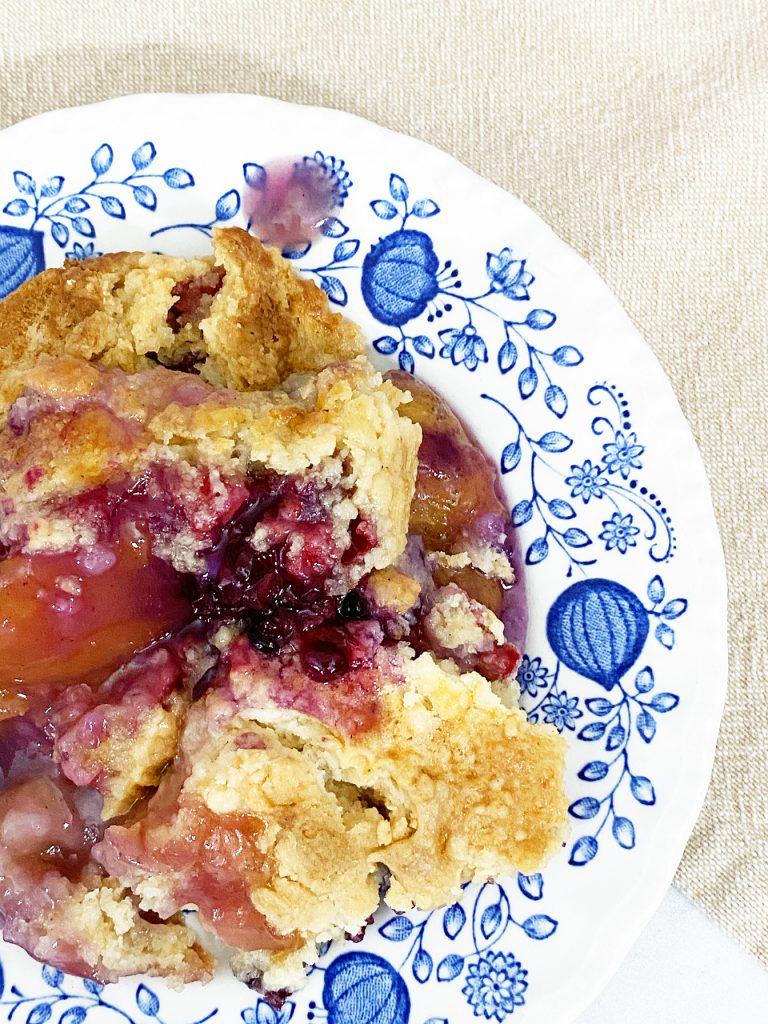 Easy Berry Peach Dump Cake Recipe by Pineapple Paper Co.