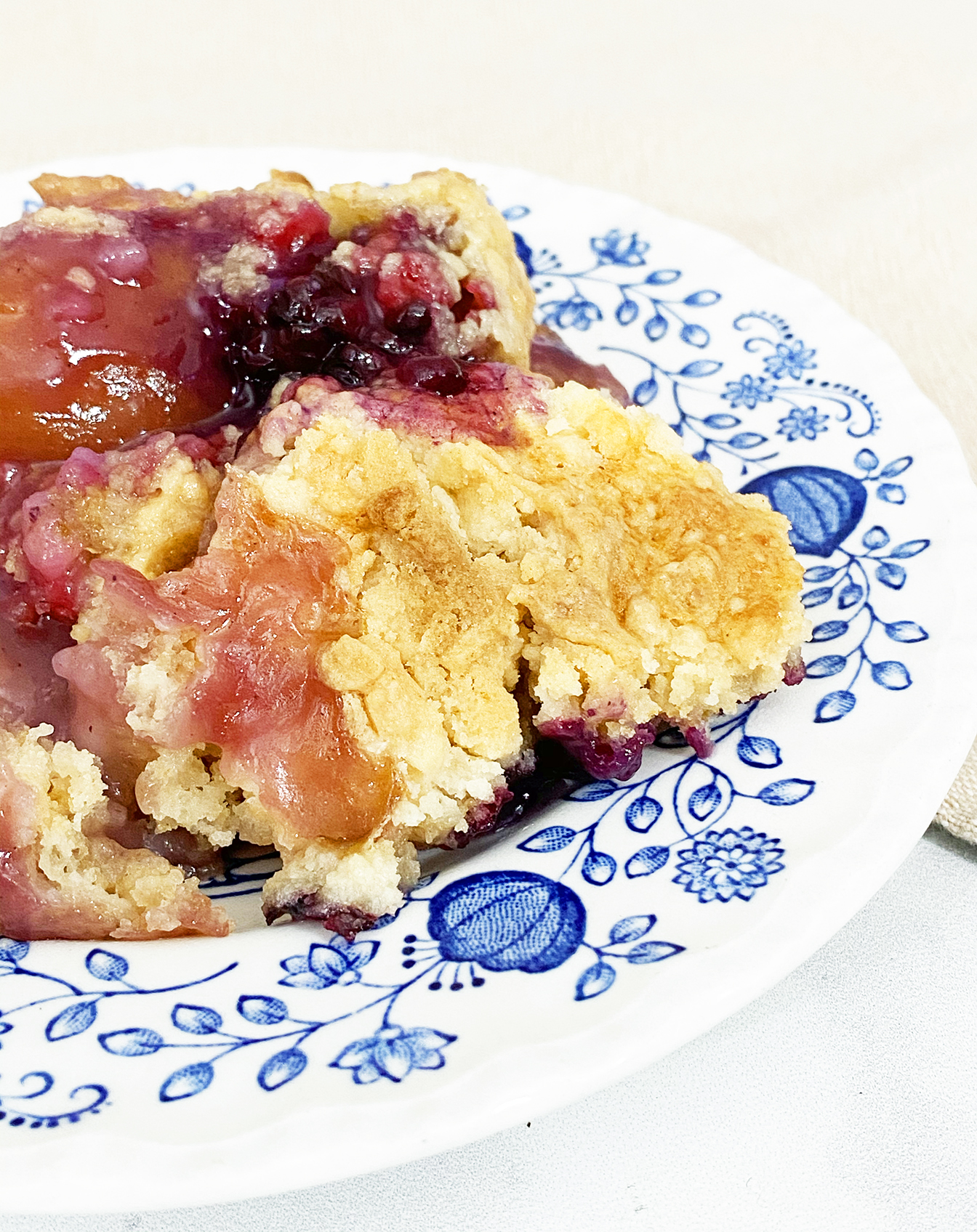 Easy Berry Peach Dump Cake Recipe by Pineapple Paper Co.