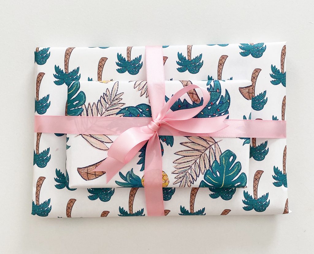 Tropical Printable Wrapping Paper tied with Light Pink Ribbon