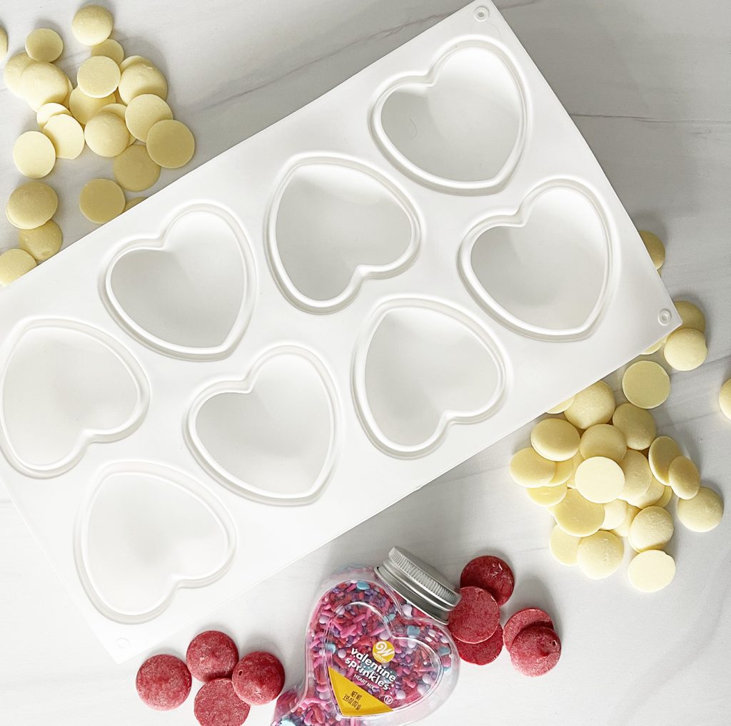 White Heart Silicone Mold for Chocolate with White Candy Coating, Red Candy Coating and Valentine Sprinkles