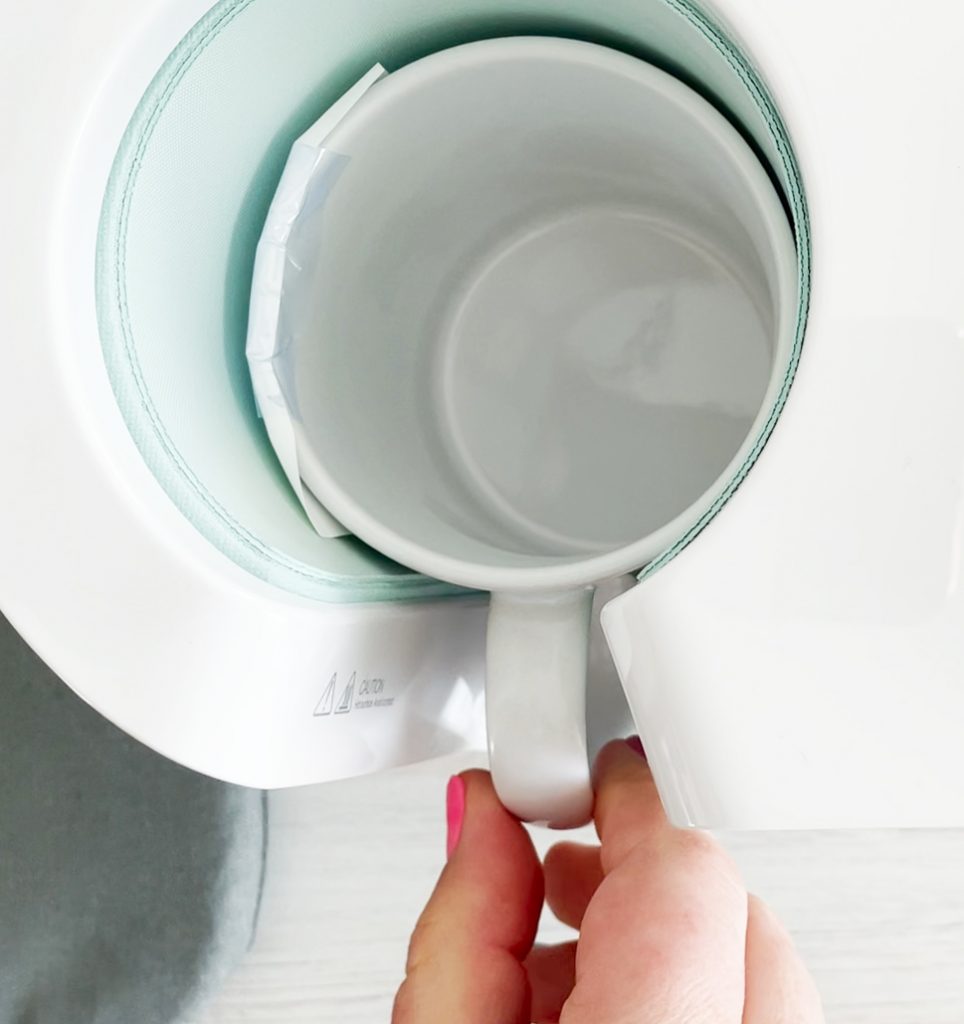 Inserting Blank Sublimation Mug with Design into Cricut Mug Press