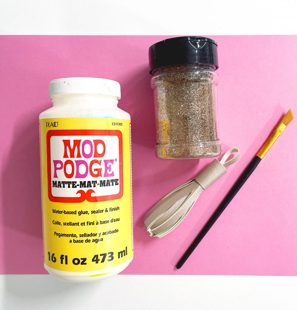 Mod Podge and Glitter to Make DIY Glitter Leather Tassel