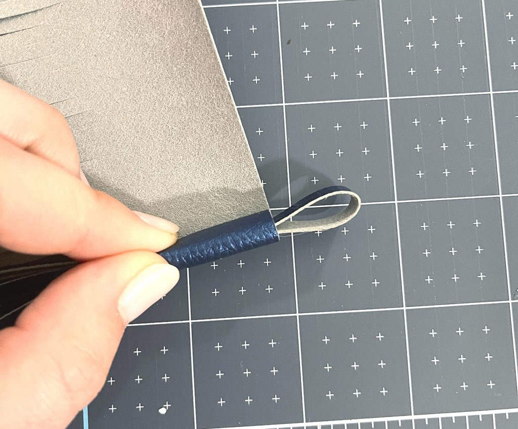 Roll Tassel around Loop to make your own DIY Leather Tassel