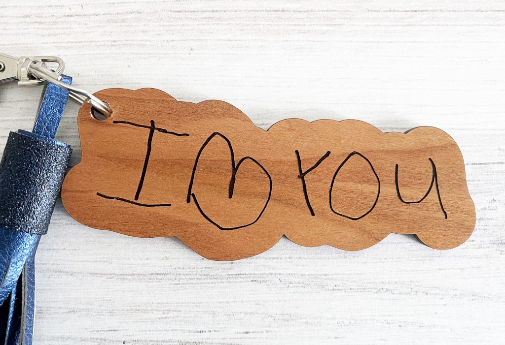 DIY Laser Cut Wood Keychain with I Love You in Toddler Handwriting Made with Glowforge