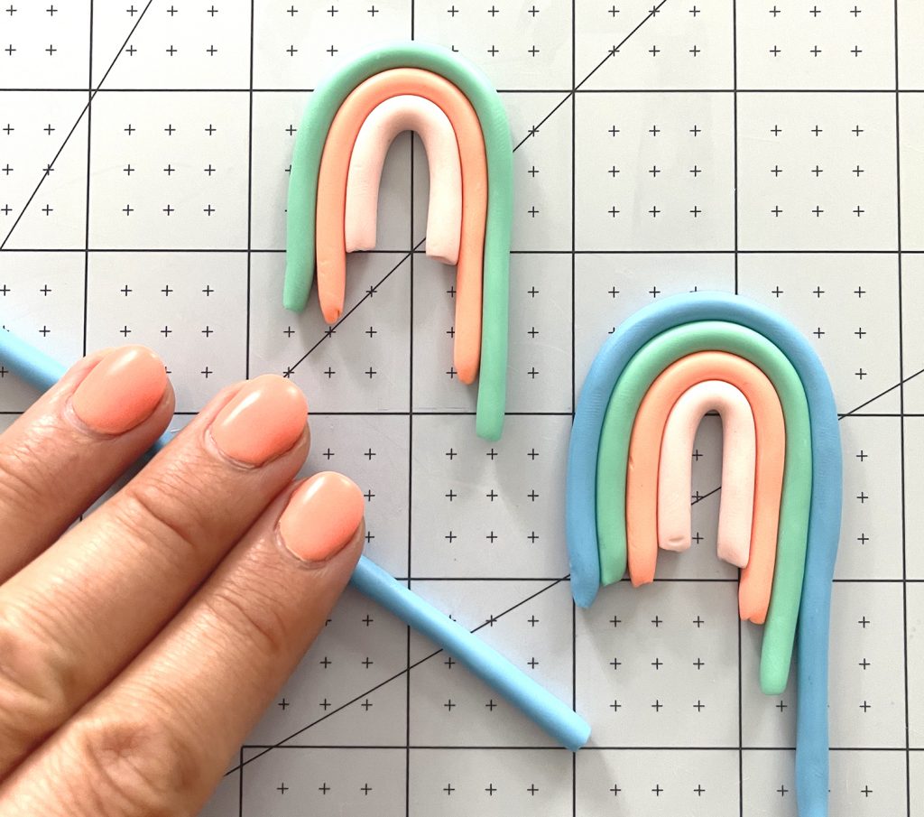 roll polymer clay ropes for rainbow arch earrings