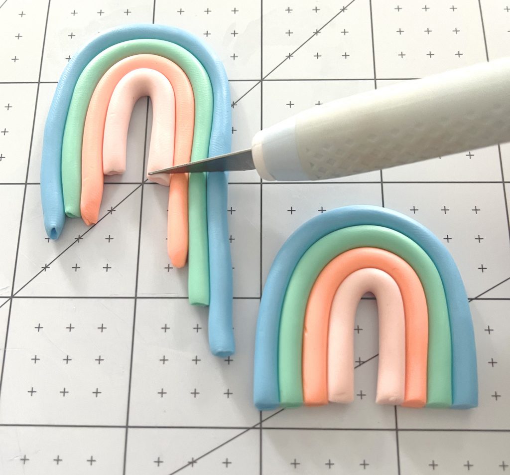 trim rainbow arch clay earrings with craft knife