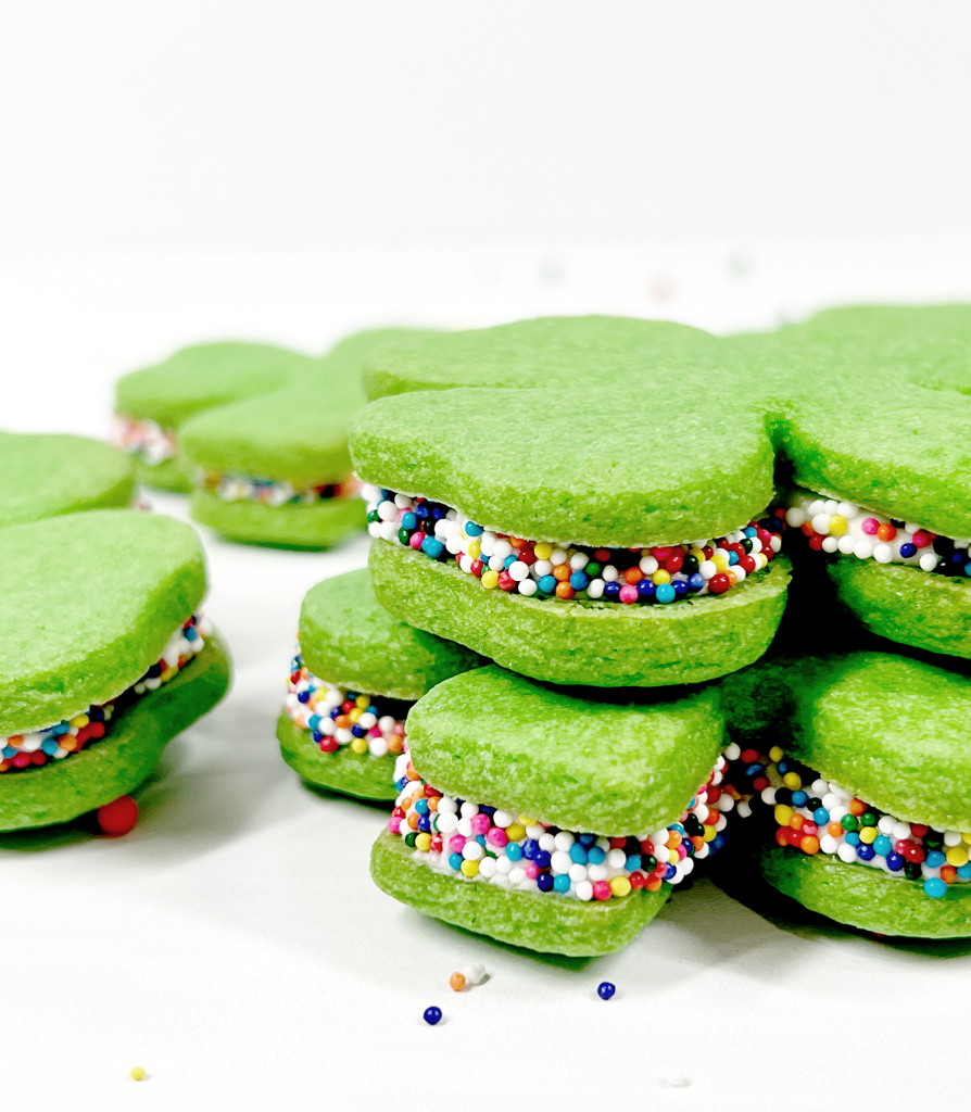 shamrock cookies with rainbow sprinkles