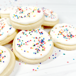 cut out sugar cookies with rainbow sprinkles close up