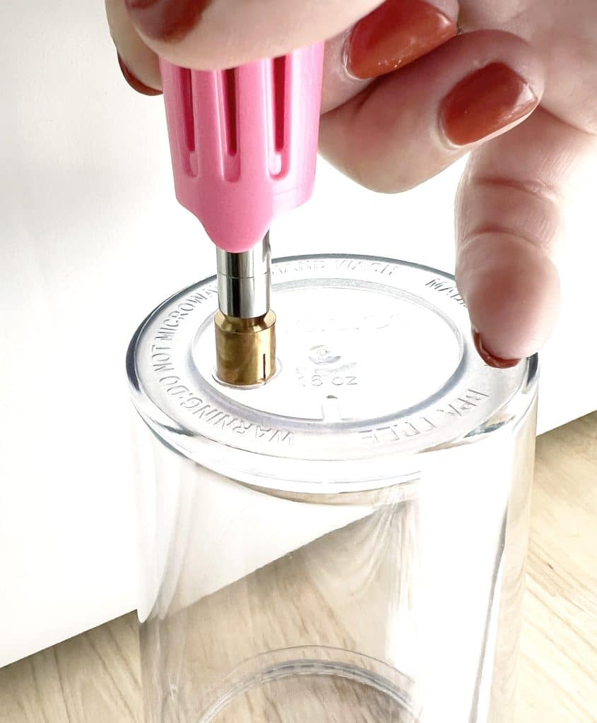 making hole in no drill snow globe tumbler with hot fix rhinestone tool