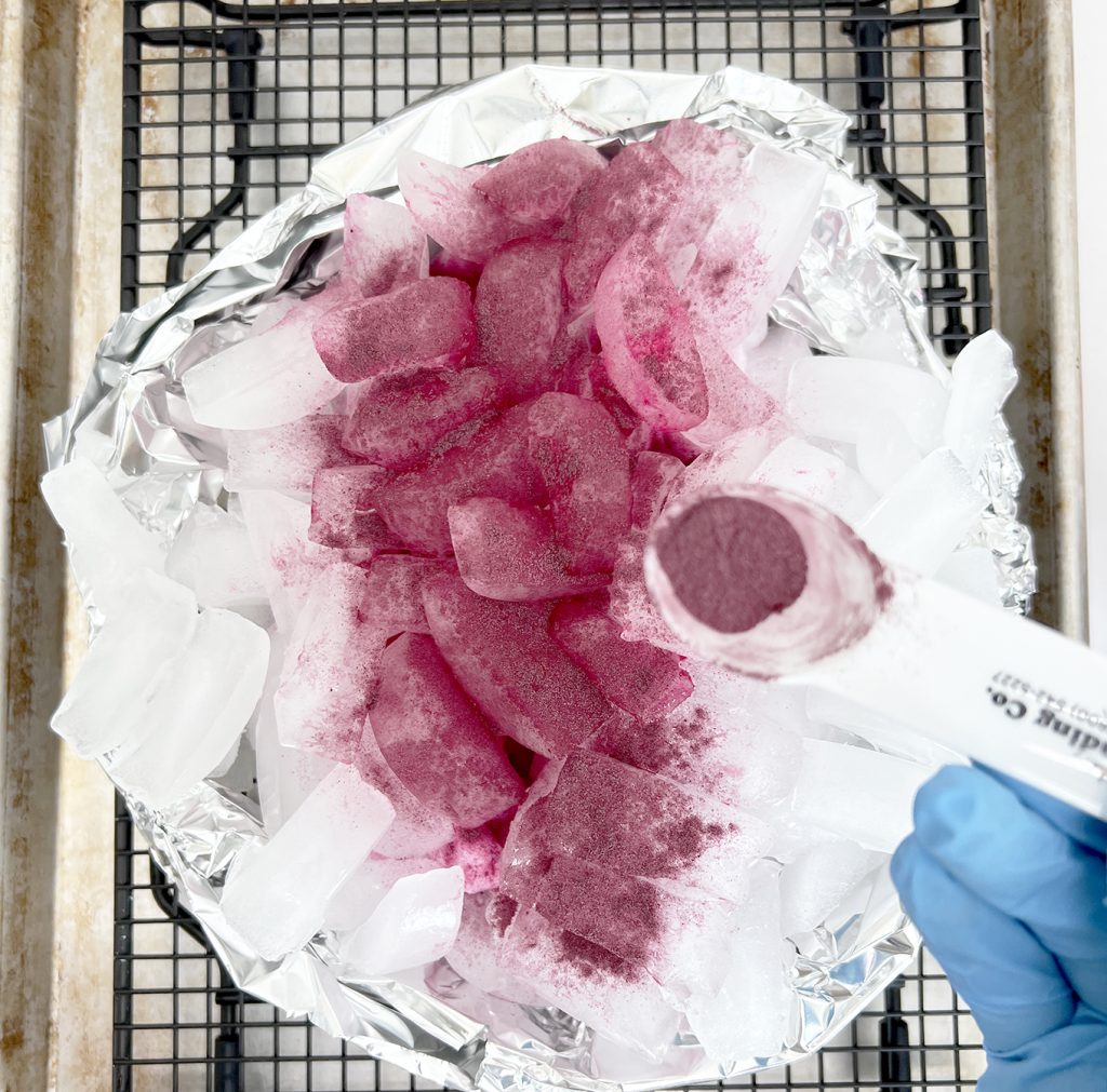 sprinkle powder dye on top of ice for ice dye