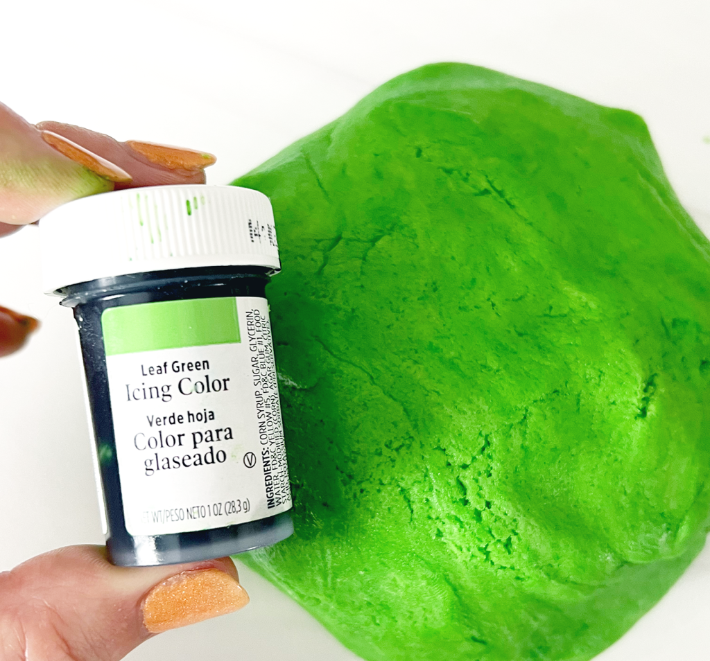 green paste food coloring and cookie dough for shamrock cookies