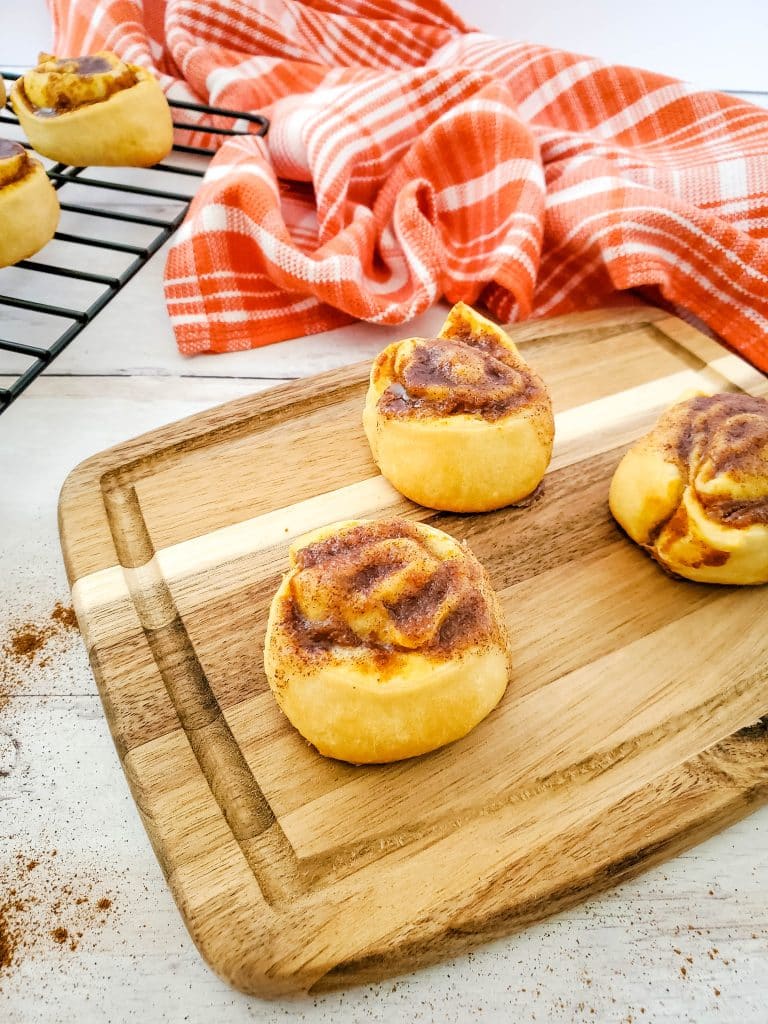 pumpkin pie crescent roll pinwheels on cutting board