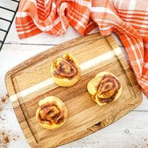 pumpkin pie crescent roll pinwheels on cutting board