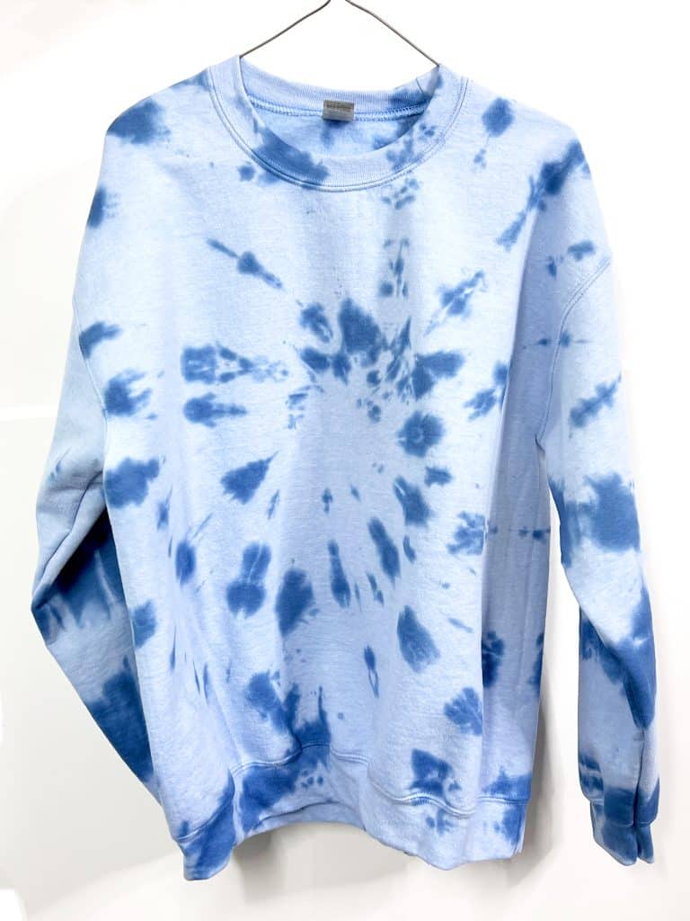 light blue sweatshirt with denim blue spiral tie dye