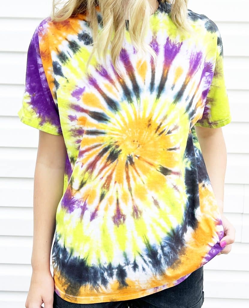 halloween colored tie dye spiral shirt on model