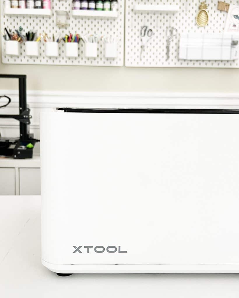 xtool m1 laser cutter sitting on desk in craft room
