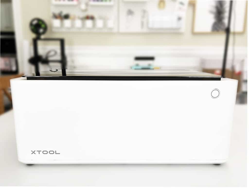 xTool M1 desktop hybrid laser and blade cutting machine in craft room