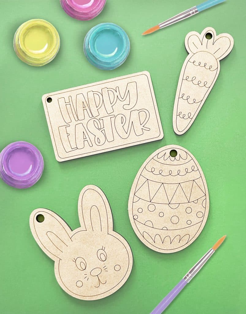 laser cut paint kit for easter with pastel colored paint and paintbrushes