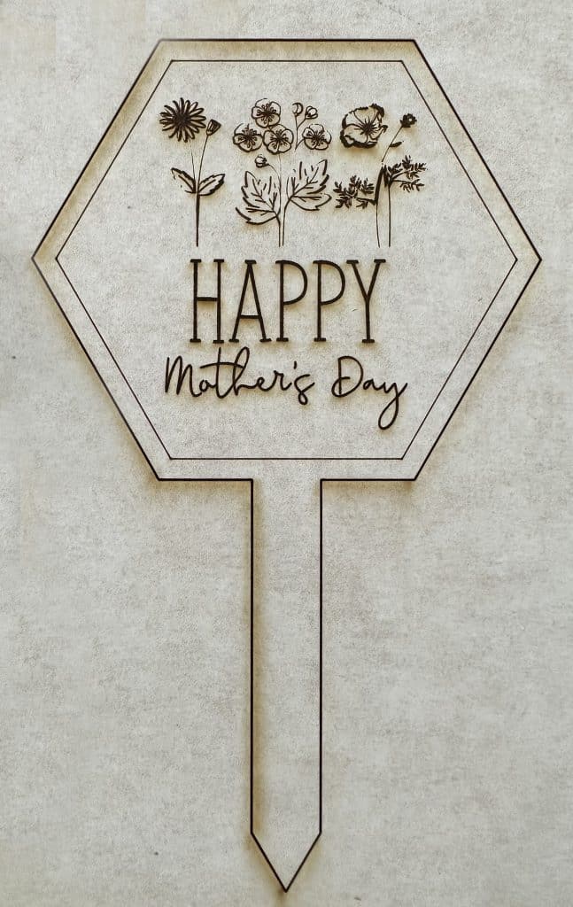 plant marker for mother's day with birth month flowers with protective paper on laser cutting machine