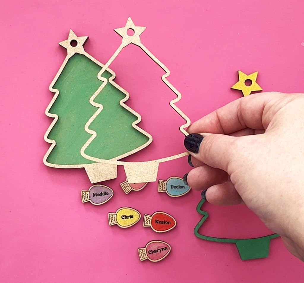 assembling christmas tree personalized family christmas shaker ornament with lights made with xTool laser
