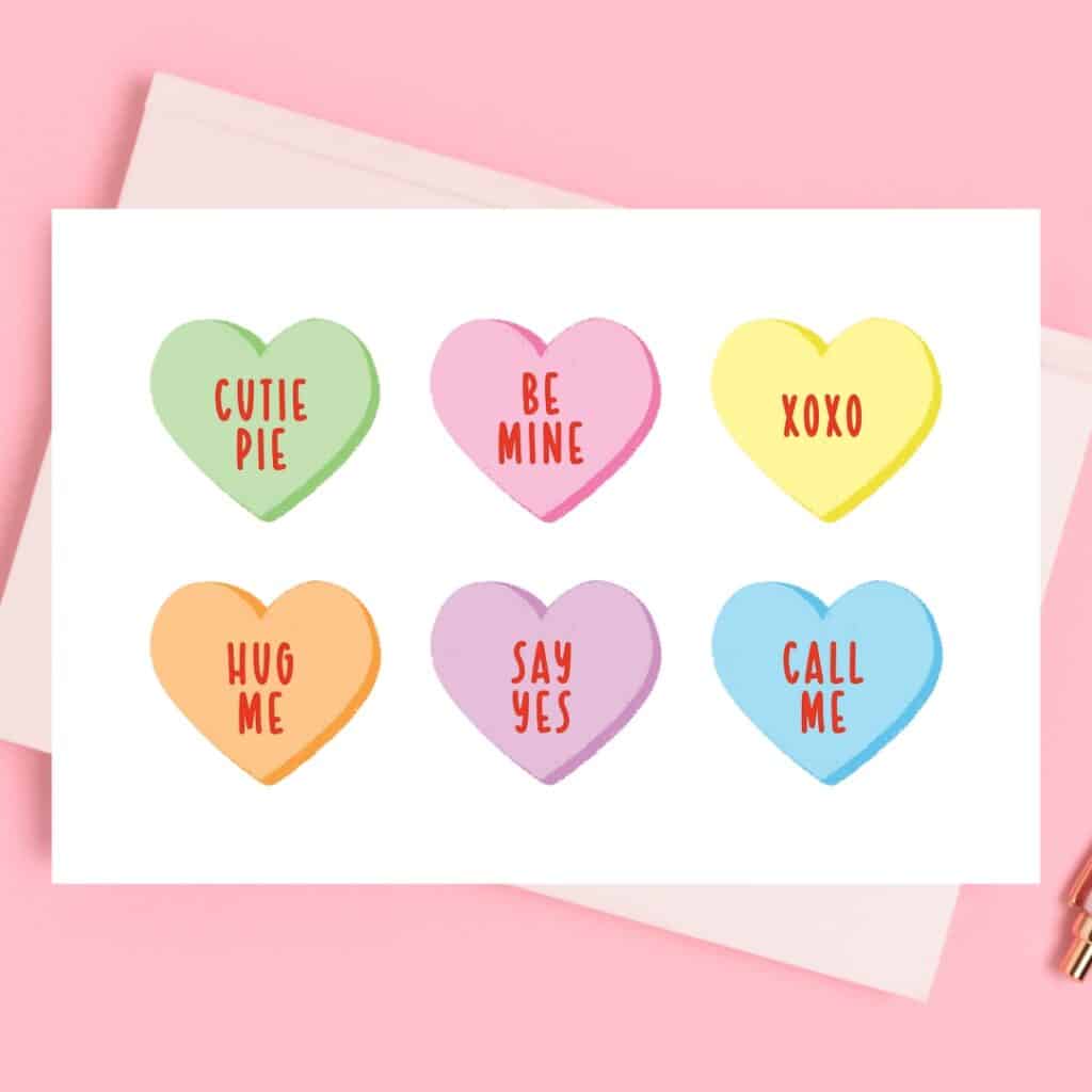 free printable conversation heart stickers on card with pink background