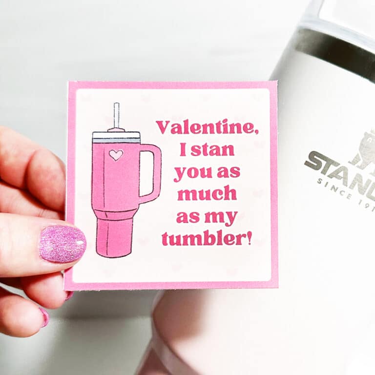 hand holding printable stanley valentine card in front of stnaley tumbler
